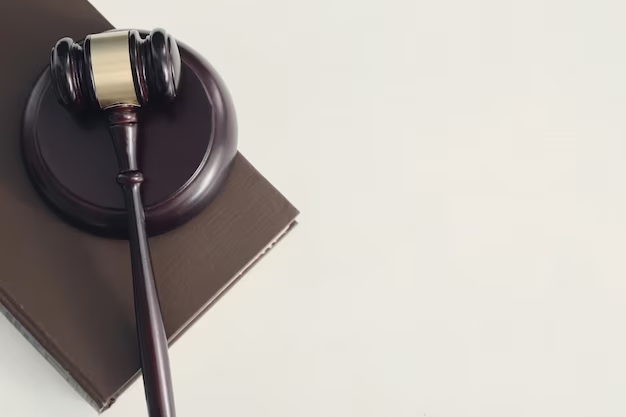 Wooden gavel and a book